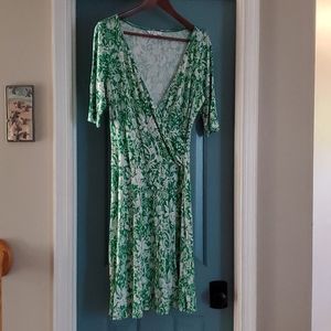 Green and white Cabi faux wrap dress.